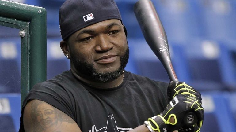 Boston Red Sox's David Ortiz watches his teammates take batting...