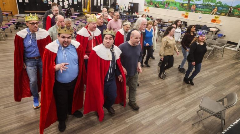 Members sing during a recent rehearsal.