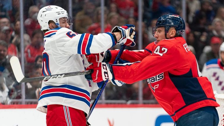 Rangers left wing Will Cuylle (50) and Washington Capitals defenseman...