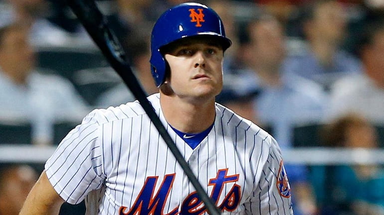 Jay Bruce reacts after flying out in the second inning...