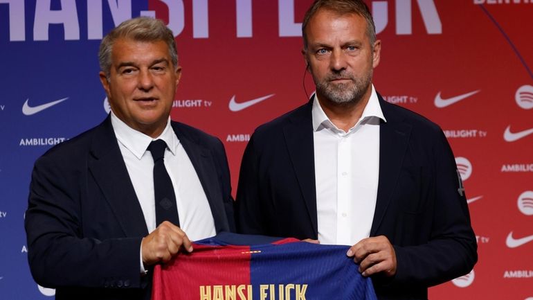 Barcelona's new coach Hansi Flick and Barcelona FC President, Joan...