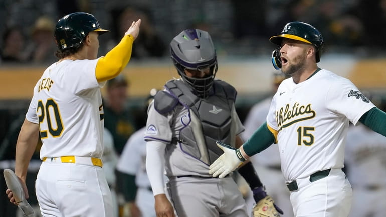 Oakland Athletics' Seth Brown (15) celebrates after hitting a two-run...