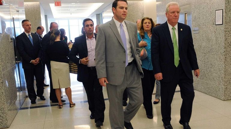 Sgt. Kevin Brennan is seen leaving Judge Tomei's courtroom in...