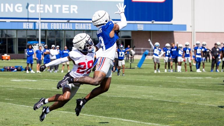 Giants corner Cor’Dale Flott (quad) defends receiver Malik Nabers during...