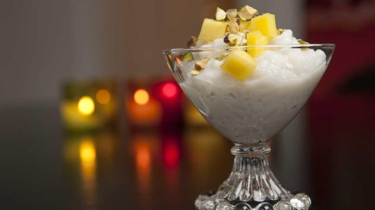 Coconut-ginger rice pudding follows the tradition of Sephardic Jews, who...