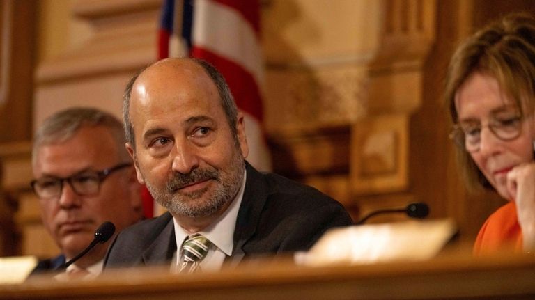 John Fervier, Chairman of the State Election Board, listens during...