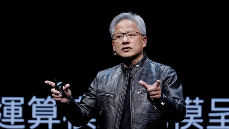 Nvidia CEO Jensen Huang speaks at the Computex 2024 exhibition...