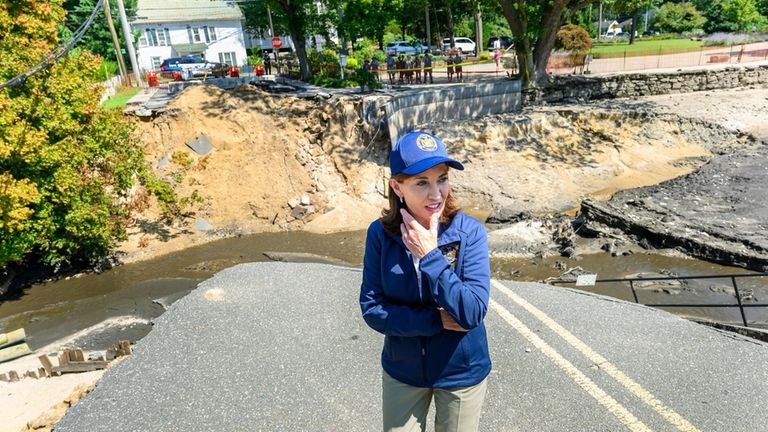 Governor Kathy Hochul inspects the damage Tuesday from flooding on...