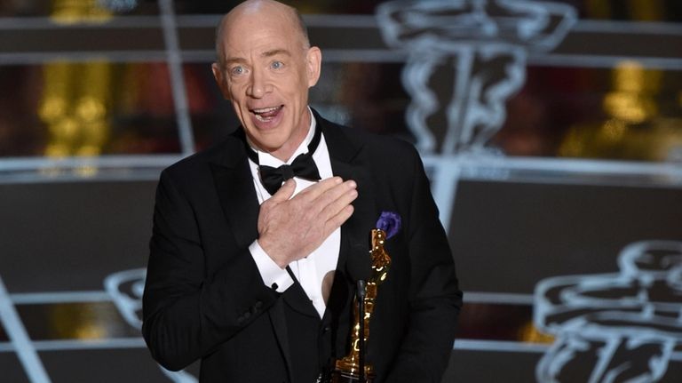 J.K. Simmons accepts the award for best actor in a...