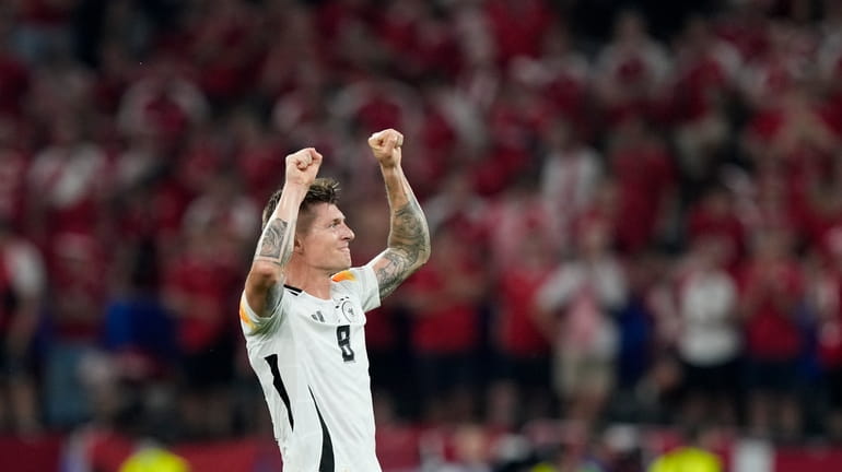 Germany's Toni Kroos celebrates after the round of sixteen match...