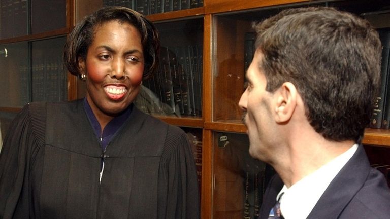 Judge Toni A. Bean in 2004 with then-Suffolk County Executive...