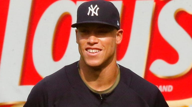 Aaron Judge of the Yankees looks on against the Rays...