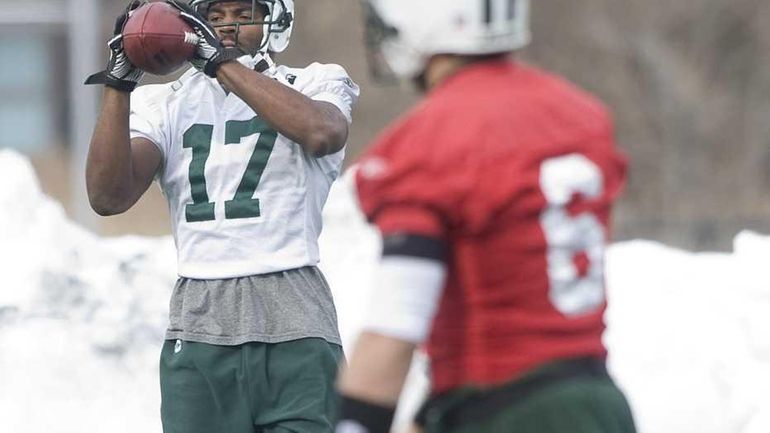 New York Jets wide receiver Braylon Edwards catches a ball...