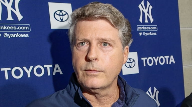 Yankees owner Hal Steinbrenner talks with the media during spring training at George M....