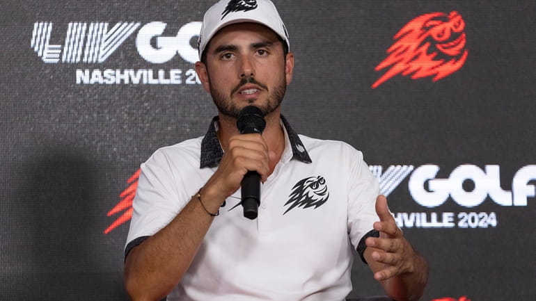 Abraham Ancer, of Fireballs GC, speaks with the media during...