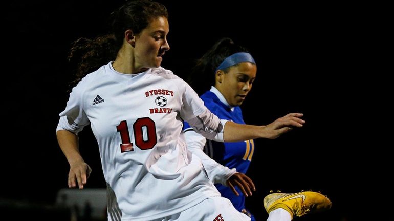 Isabella Romano of Syosset battles for the ball against Alyssa...