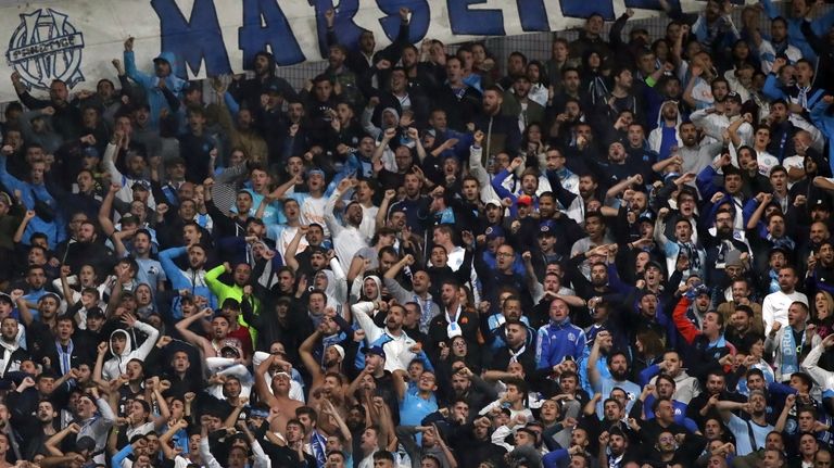 Marseille fans support their team before the French League One...