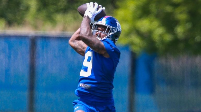 Malik Nabers of the Giants catches a pass during rookie minicamp at...