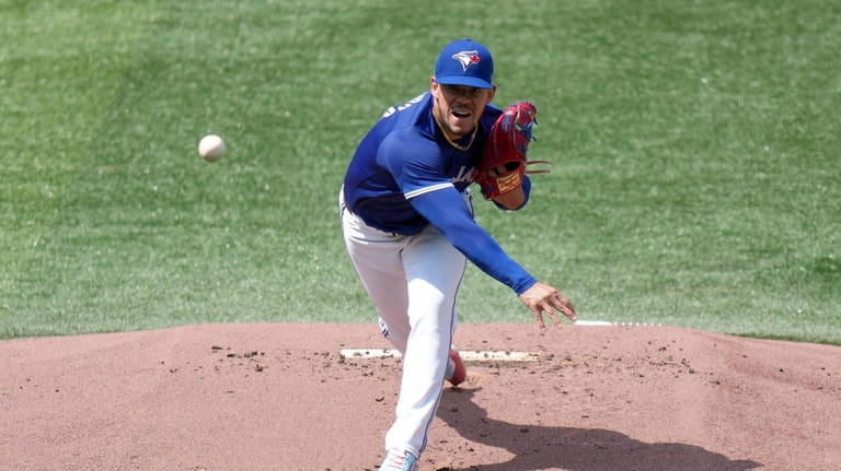 Toronto Blue Jays pitcher Jose Berrios throws during the first...