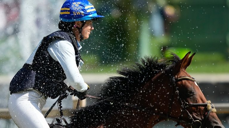 Sweden's Sofia Sjoborg, riding, Bryjamolga Vh Marienshof, during the Equestrian...