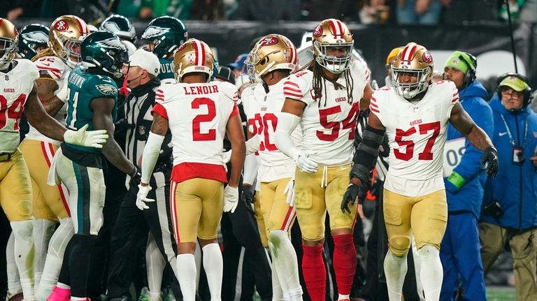 San Francisco 49ers linebacker Dre Greenlaw (57) looks on after...