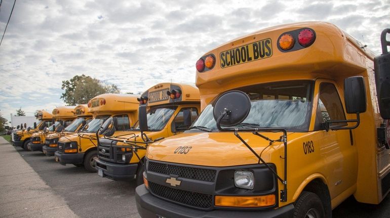 Buses at the Baumann & Sons Buses Inc. yard on...