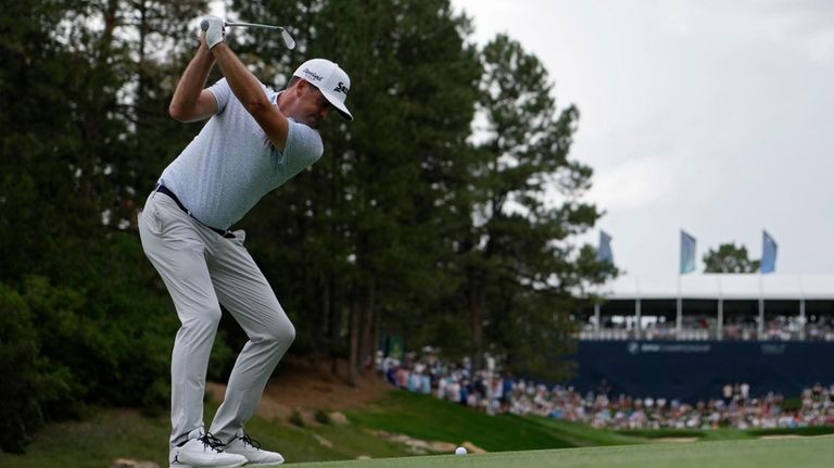 Keegan Bradley hits from the 17th fairway during the third...