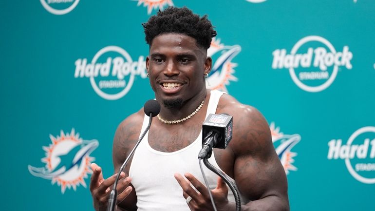 Miami Dolphins wide receiver Tyreek Hill speaks during an NFL...