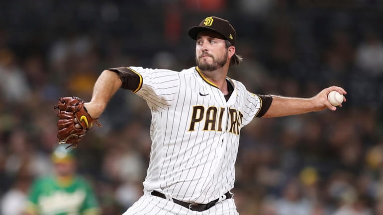 San Diego Padres relief pitcher Drew Pomeranz winds up during...