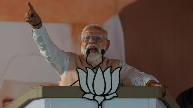 Indian Prime Minister Narendra Modi speaks at an election campaign...