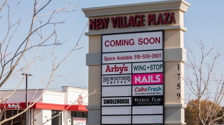 An Arby's, a nail salon and an AT&T store are...