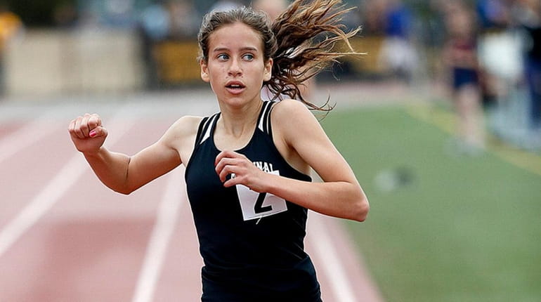 Mt. Sinai's Sarah Connelly wins the girls 300-meter run in...