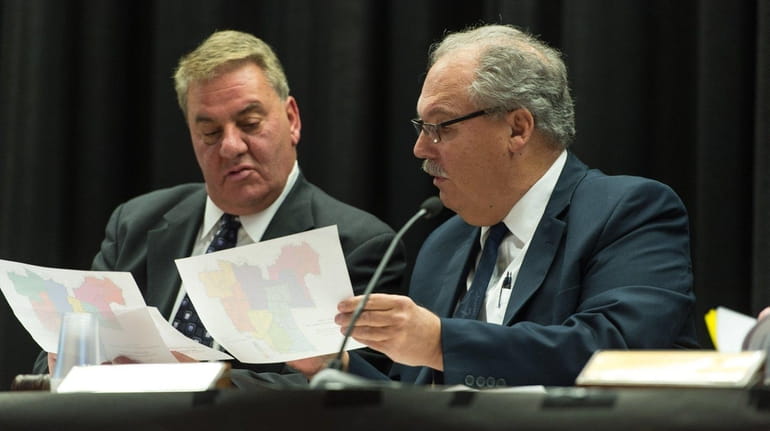 Michael Timo, left, and Sachem School Board President Anthony Falco...