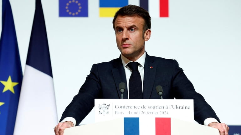 French President Emmanuel Macron speaks during a press conference at...