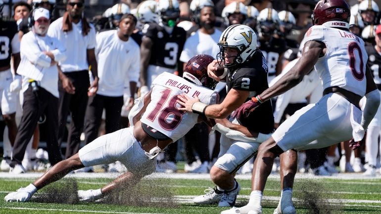 Vanderbilt quarterback Diego Pavia (2) runs the ball against Virginia...