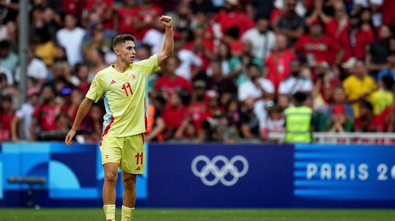 Spain's Fermin Lopez celebrates is side's first goal during a...