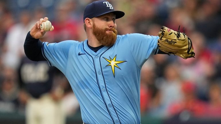 Tampa Bay Rays' Zack LIttell pitches in the first inning...