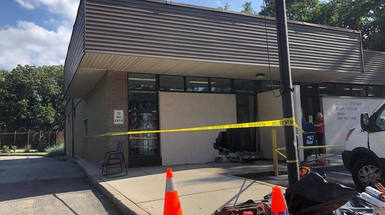 The scene at the Ridge Post Office after it was...