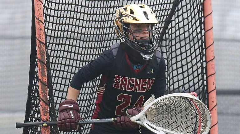 Sachem East goalie Marissa Cuevas watches the movement of the...