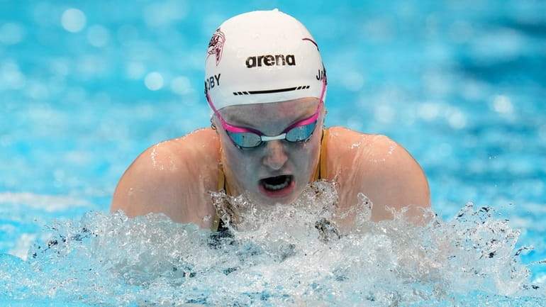 Lydia Jacoby swims during the Women's 100 breaststroke preliminary heat...