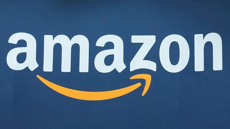 The Amazon logo is seen, June 15, 2023, at the...
