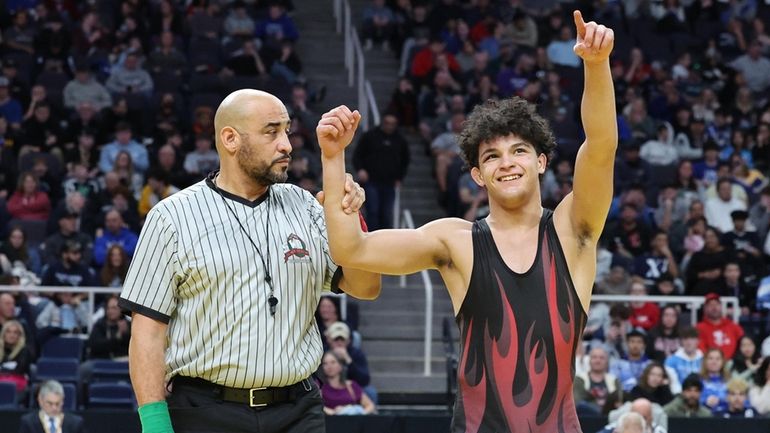 Devin Downes, Plainedge defeats Leo Venables of Carmel in the...