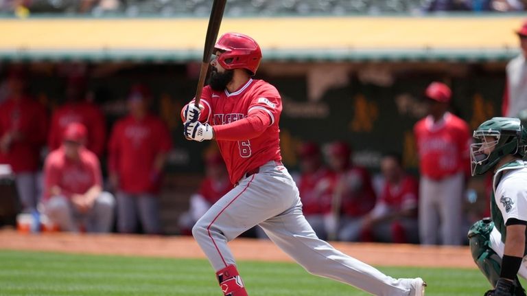 Los Angeles Angels' Anthony Rendon hits a single during the...