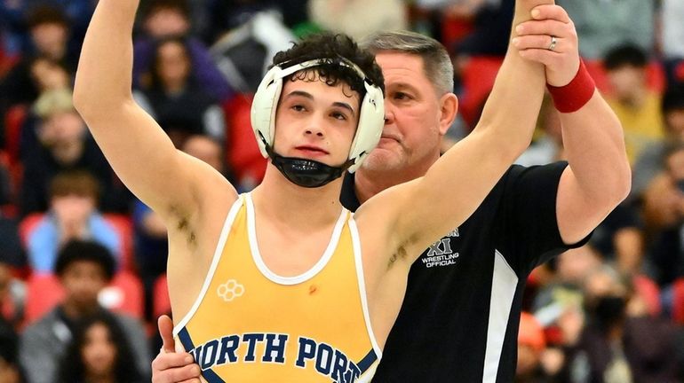 Matt Marlow of Northport wins at 124 pounds during the Suffolk...