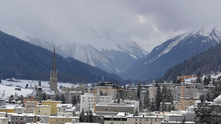 Snow covers the hills around Davos, Switzerland, on Jan. 19,...