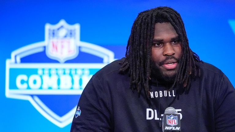 Texas defensive lineman T'Vondre Sweat speaks during a press conference...