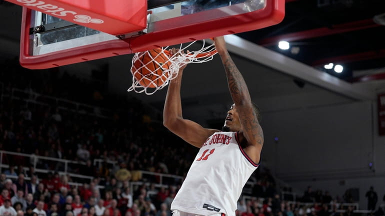 Joel Soriano of St. John's scores against Stony Brook at Carnesecca Arena...