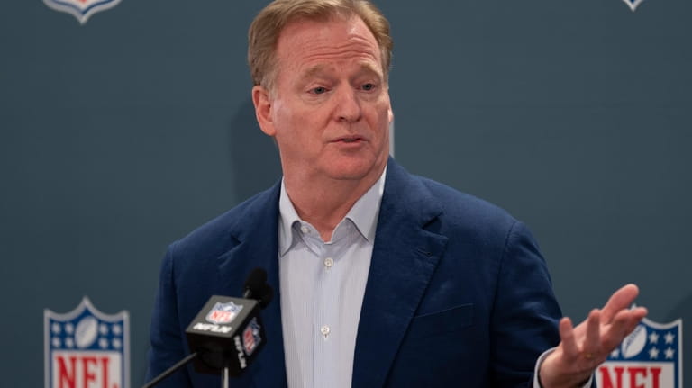 NFL Commissioner Roger Goodell responds to questions during a news...