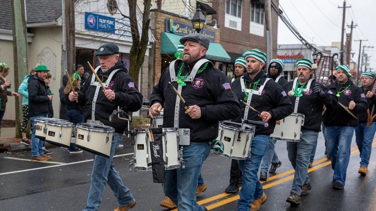 The Wyandanch Fire Company band takes part in the St....