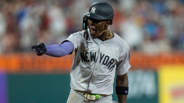 The Yankees' Jazz Chisholm Jr. reacts to his three-run home...